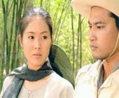 Actor Hung Dong and actress Le Phuong in Vo Ngua Troi Nam film.
